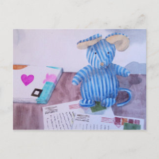 Beanie writes his postcards