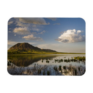 Bear Butte reflects into Bear Butte Lake near Magnet