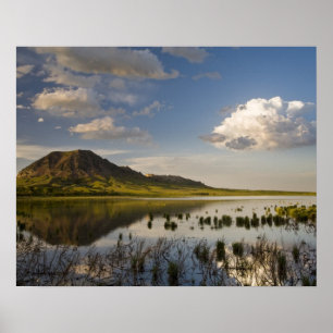 Bear Butte reflects into Bear Butte Lake near Poster