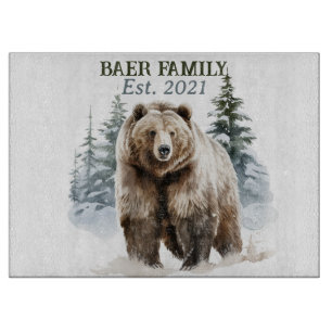 Bear in the snowy forest cutting board