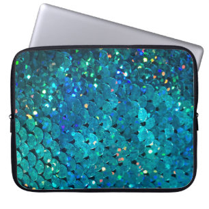 Beautiful and colourful sequins sparkling under th laptop sleeve