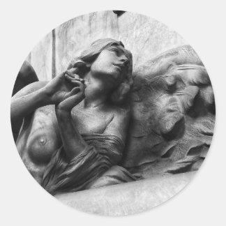 Beautiful angel looking up to heaven classic round sticker