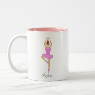 Beautiful ballet dancer dressed in light pink Two-Tone coffee mug