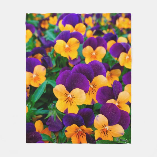 Beautiful blooming pansies in the garden fleece blanket (Front)