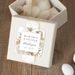 Beautiful Boho Botanical White Wedding Favour Square Sticker<br><div class="desc">This elegant yet modern favour sticker design features lovely watercolor illustrations of bohemian inspired florals with your names and wedding date. This timeless design is an excellent choice for many styles of events, from classic to boho. Customised favour labels make a wonderful addition to your wedding reception or bridal shower...</div>