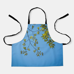 beautiful branch with green and yellow leaves hug apron