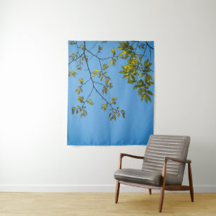 beautiful branch with green and yellow leaves hug tapestry