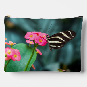 Beautiful butterfly on a pink flower accessory pouch