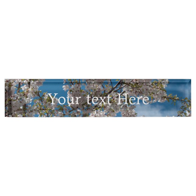 Beautiful cherry blossoming tree against blue sky. nameplate (Front)