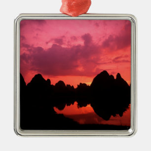 Beautiful colour at sunset of limestone mountains metal tree decoration