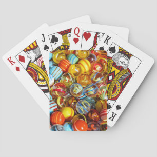 beautiful colourful glass marble balls photograph playing cards