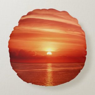 Beautiful colourful sunrise at the sea with dramat round cushion