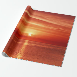 Beautiful colourful sunrise at the sea with dramat wrapping paper