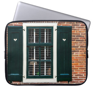 Beautiful dutch traditional houses. Brick wall wit Laptop Sleeve