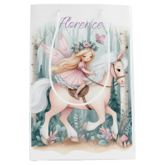 Beautiful fairy girl riding in an enchanted forest medium gift bag