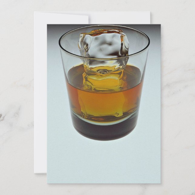 Beautiful glass filled with Scotch and ice cube (Front)