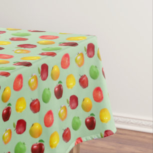 Beautiful Natural Colourful Apples on Light Green Tablecloth