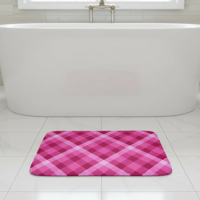 Beautiful Pink Magenta Plaid Small Bath Mat (Beautiful Pink Magenta Plaid Small Bath Mat laying flat on tile floor in front of tub in bathroom.)