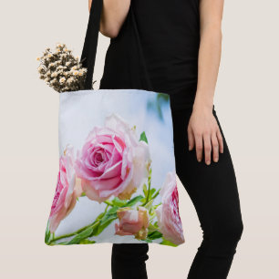 Beautiful pink rose flower in garden tote bag