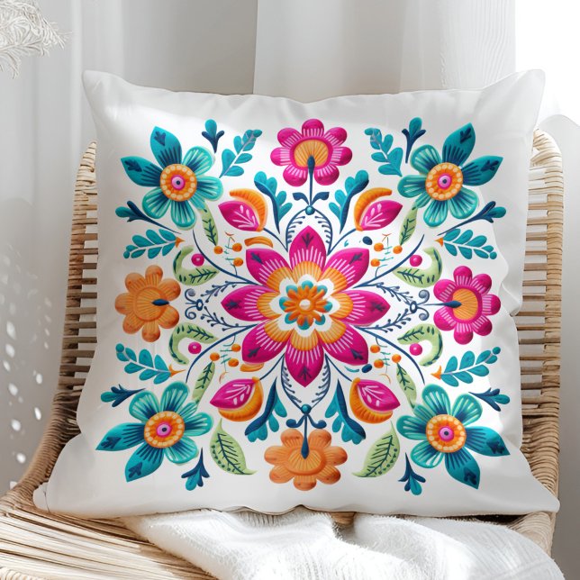 Beautiful Pink Turquoise Orange Mexican Floral Cushion (Beautiful Pink Turquoise Orange Mexican Floral Throw Pillow on a sunny rattan chair.)
