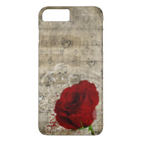 Beautiful red rose music notes swirl faded piano