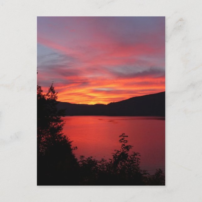 Beautiful red sunrise over a lake postcard (Front)