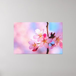 Beautiful Sakura Flowers On A Vertical Twig Canvas Print