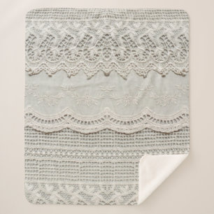 Beautiful, subtle, white laced textile close up.  sherpa blanket