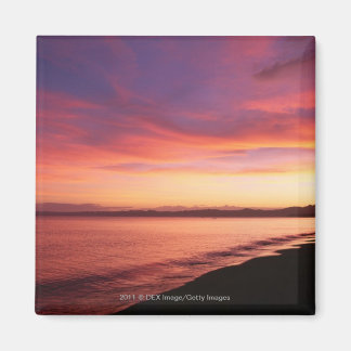 Beautiful sunset at the beach magnet