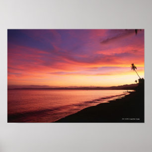 Beautiful sunset at the beach poster