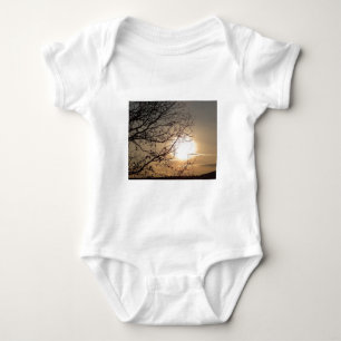 Beautiful sunset with branchs baby bodysuit