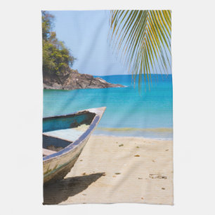 Beautiful Tropical Beach with a Rowboat Tea Towel
