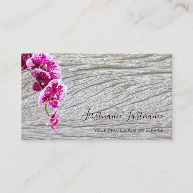 Beautiful violet pink orchid blossom on wood business card (Front)