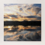 Beautiful Winter Sunset over Lake Photo Jigsaw Puzzle<br><div class="desc">This puzzle features a beautiful photo of a winter sunset reflected in the water of a lake. The sky is filled with clouds in shades of peach,  blue and gray,  and you can see a few leafless trees on the horizon.</div>