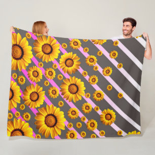 Beautiful yellow flowers on grey, pink stripes fleece blanket