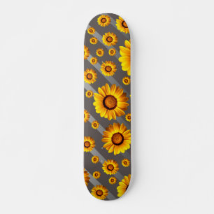 Beautiful yellow flowers on grey, silver stripes skateboard