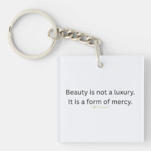 Beauty is Not a Luxury, It is a Form of Mercy Key Ring