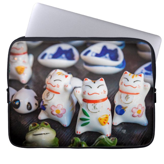 Beckoning cat figurines laptop sleeve (Front)