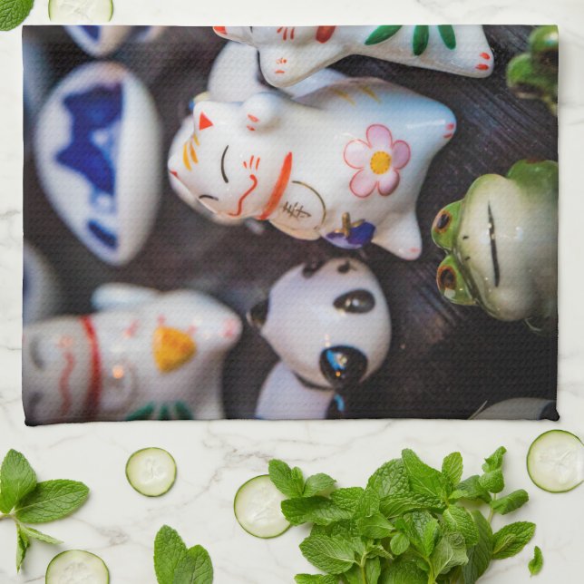 Beckoning cat figurines tea towel (Folded)