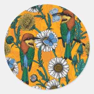 Bee-eaters, blue butterflies and daisies on orange classic round sticker