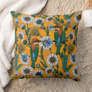 Bee-eaters, blue butterflies and daisies on orange cushion