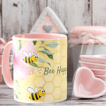 Bee Happy bumble bees yellow honeycomb summer Mug<br><div class="desc">Add some fun and humour to your work space! Yellow,  white background with a honeycomb pattern. Decorated with pink tropical florals flowers,  hibiscus and happy bumble bees. The text: Bee Happy with a hand lettered style script.  Perfect for your summer home office!</div>