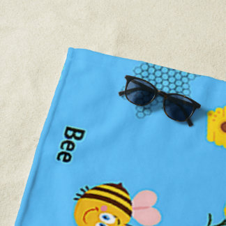 Bee pattern on blue beach towel