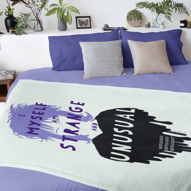 Beetlejuice | Lydia "Strange and Unusual" Graphic Fleece Blanket (Blanket on top of bed)