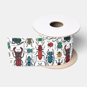 Beetles on white satin ribbon