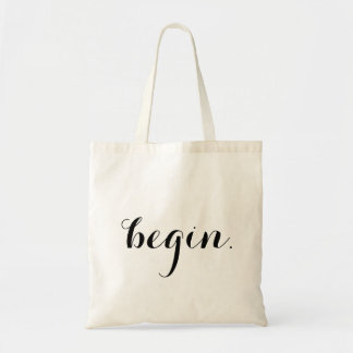 "begin." tote bag
