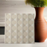 Beige Floating Circles Ceramic Tile<br><div class="desc">Circles in beige seem to float on a sculpted stripe background on this tile. Original design by international generative artist Judi Suni Hall for Gingezel.</div>