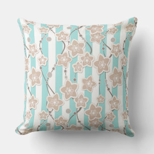 beige floral pattern on mint with white striped  cushion