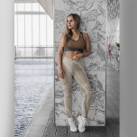 Beige Leggings with a Rose<br><div class="desc">Have a look at this beautiful marble-like, light-coloured custom leggings with the note "Life" and a Rose graphic on the side of each leg. This beige, cream, light brown colour can be easily matched with any top. You can update "Life" to a different word or use Name, or Nickname. You...</div>