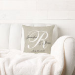 Beige Linen Monogram Newlywed Wedding Keepsake Cushion<br><div class="desc">Personalised beige, black and white monogrammed pillow with bride and groom names and wedding date in a script font overlay design on a PRINTED beige linen photo effect background. Elke Clarke© for MonogramGallery at Zazzle. Makes a great gift for newly weds. Great trendy, elegant accessory for your bedroom, favourite chair,...</div>